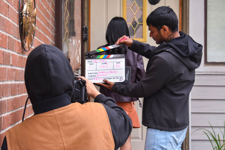 Well Who Knew BTS Photoshoot photo featuring cast and crew shooting the short film