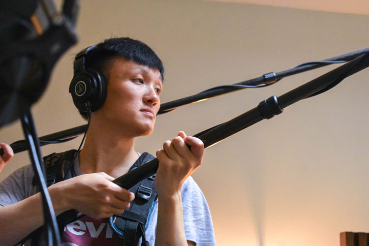 Well Who Knew BTS Photoshoot photo featuring cast and crew shooting the short film