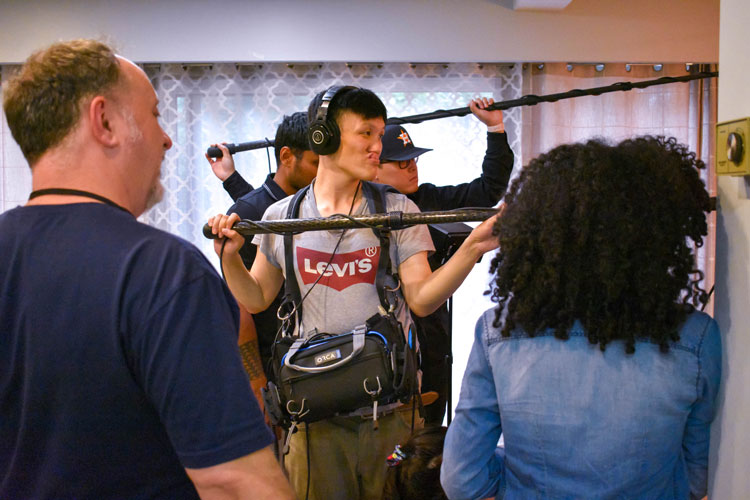 Well Who Knew BTS Photoshoot photo featuring cast and crew shooting the short film