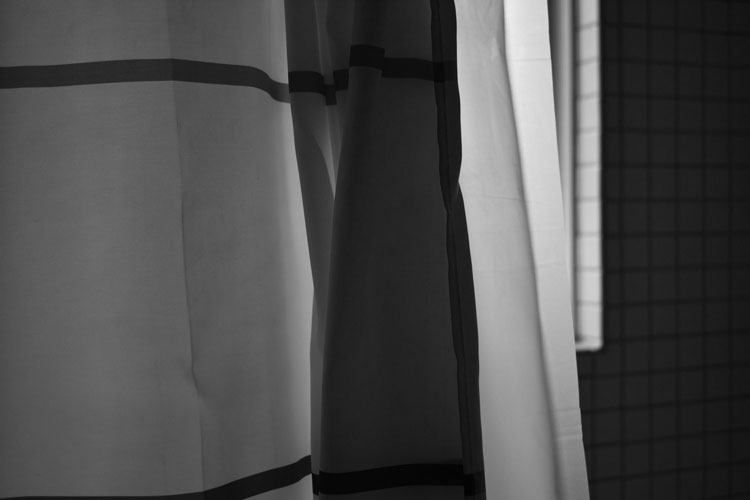 black and white photo of shower curtain