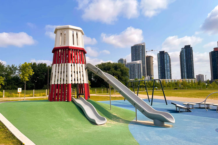 Lighthouse with slides at the pirate-themed playground at Fairwinds Park